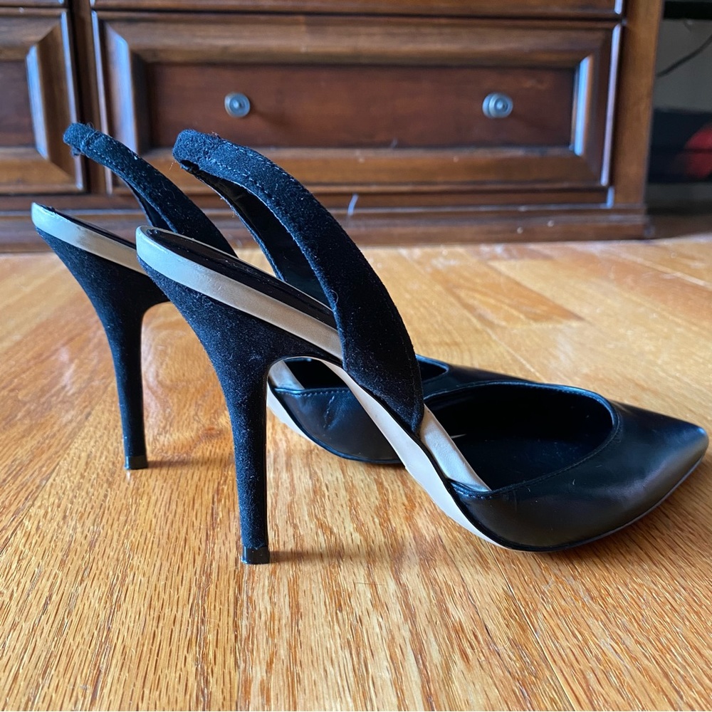 ALDO faux leather, pointed toe, 7.5 size with 3 inch heel. Never worn.